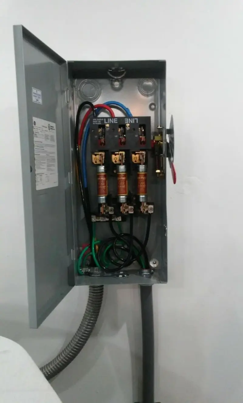 Three-phase disconnect switch installed for Smoke Detector Installation in Stanford